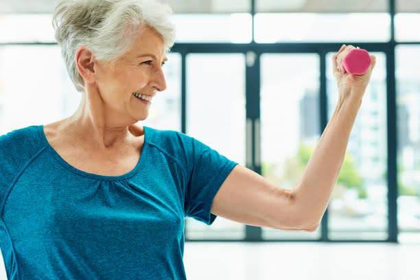 Woman working out to combat osteoporosis demonstrating benefits of Vitamin K2